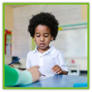 boy learning in class