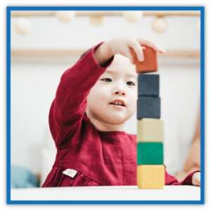 boy playing with blocks