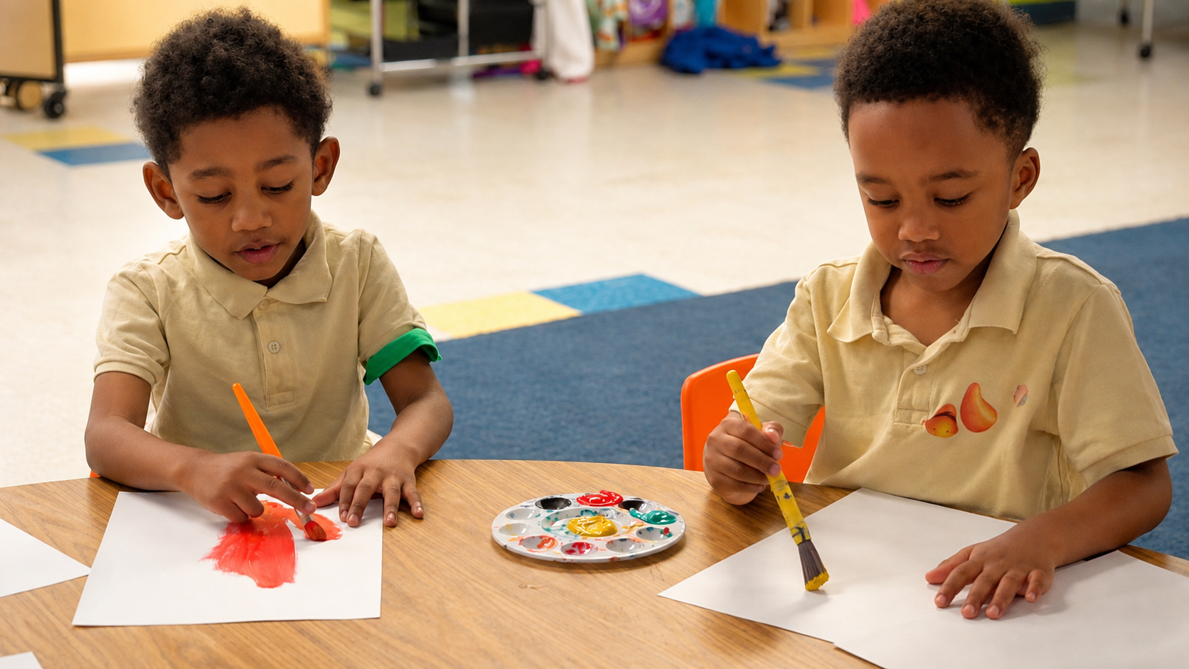 Two children painting